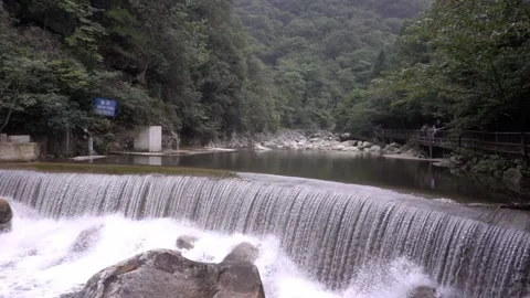 Small waterfall in summer, slow motion Stock Footage 151918830