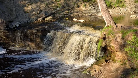 Small waterfall at sunny day. Stock Footage 76310380