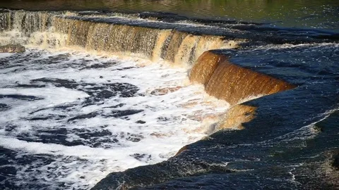 Small waterfall at sunny day. Stock Footage 76321193