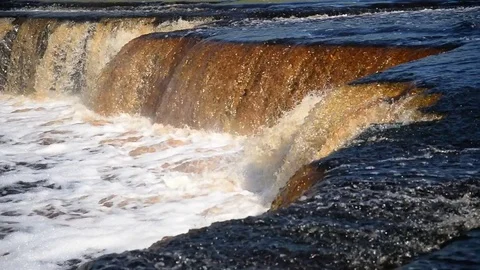 Small waterfall at sunny day. Stock Footage 76321377