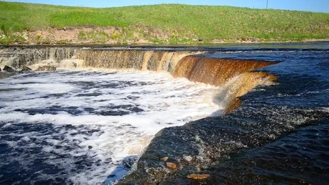Small waterfall at sunny day. Stock Footage 76322798