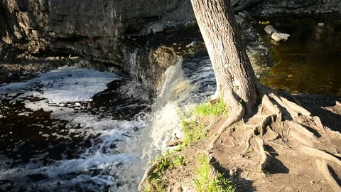Small waterfall at sunny day. Stock Footage 76323409