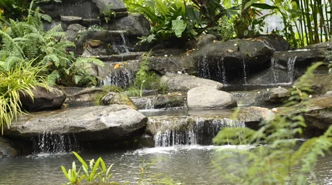 Small waterfall in tropical garden, Ratchaburi, Thailand Stock Footage 45949385