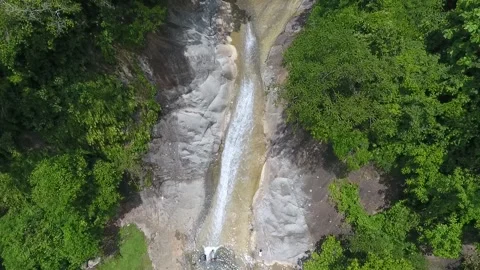 A small waterfall view captured with drone in Sumbawa, Indonesia. Stock Footage 136185698