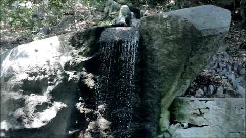 Small waterfall in the Vorontsov palace park, Crimea, Russia. August 2016 Stock Footage 77862789
