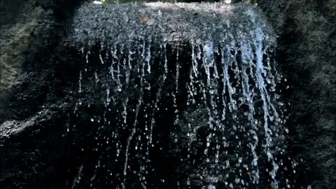 Small waterfall in the Vorontsov palace park, Crimea, Russia. August 2016 Stock Footage 77862790