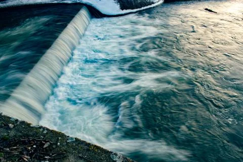 Small waterfall with water motion. Stock Photos