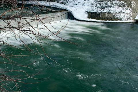Small waterfall with water motion. Stock Photos