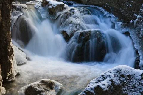 A small waterfall in winter Stock Photos