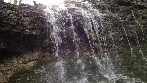 Small waterfall in the woods Stock Footage 75316894