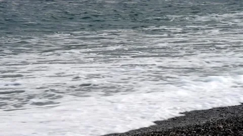 Small wave breaks on the shore Stock Footage 143455105