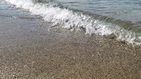 Small wave crashing into shore at Clear Lake, Riding Mountain National Park. Stock Footage 105803161