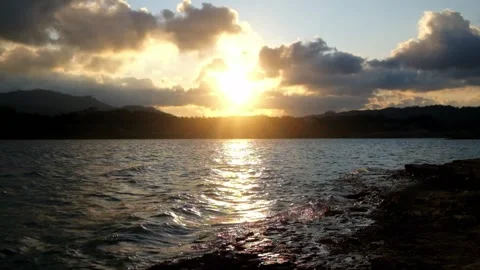 Small wave movement at sunset on the lake. Lake water moving in the wind Stock Footage 291524827