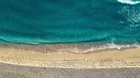 Small wave on sand beach for opening video, text space Stock Footage 261713087