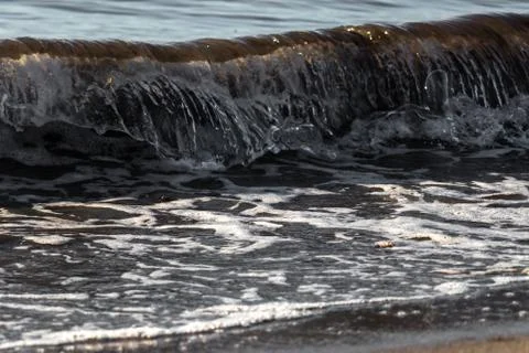 A small wave at shore 写真素材