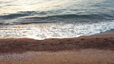 Small wave, soft wave on the sandy beach, text space. Sandy beach, view sitting Stock Footage 198021686