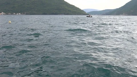 Small waves against the backdrop of the mountains Stock Footage 91967804