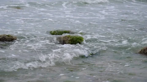 Small Waves Against Rocks Video stock 120491478