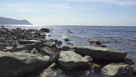 Small waves and ripples on the sea during the day Stock Footage 80485715