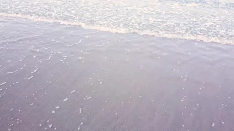 Small waves arriving at the shore of the beach with the calm sea water Stock-Footage 278204731