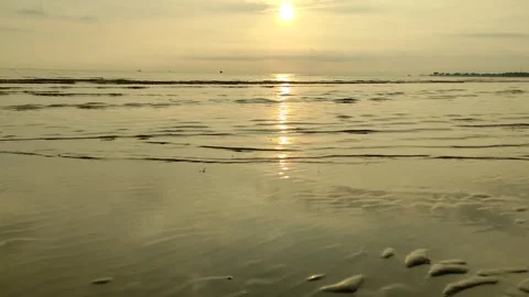 Small waves of the beach in the afternoon at sunset Stock Footage 272186981