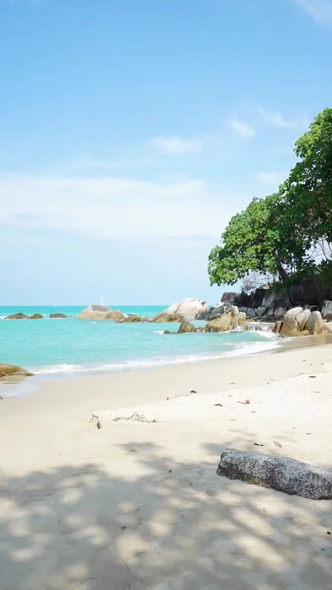 Small Waves By The Beach With Beautiful Rocks Stock Footage 244761913