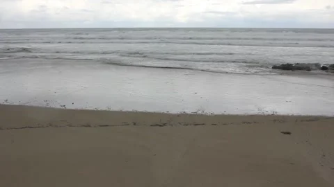 Small waves in a beach in the Cantabrian coast Stock Footage 270232890