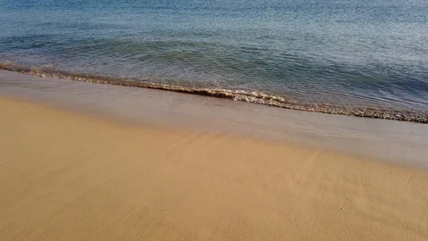 Small waves on the beach Stock Footage 104174923