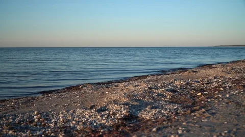 Small waves on beach Stock Footage 127934419
