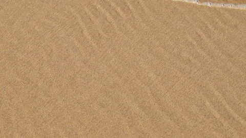 Small waves in beach sand Video stock 116725658
