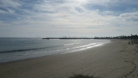 Small waves break on empty beach Stock Footage 119176663