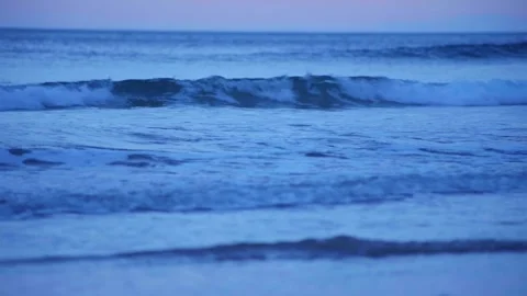Small Waves Breaking on Shore Stock Footage 253910022