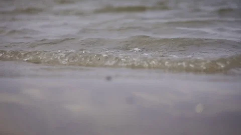 Small waves on the coast Stock Footage 78790915