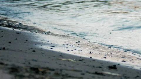 Small waves crashing on the shore Video stock 47711201