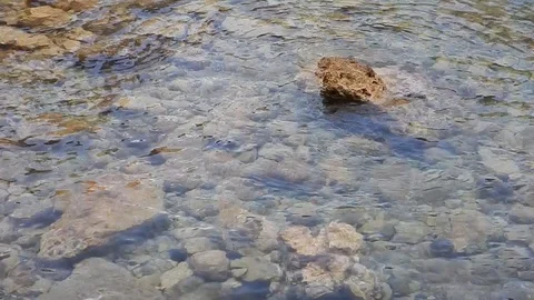 Small waves create plays of light on the surface of sea 4946 Stock Footage 108944204