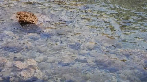 Small waves create plays of light on the surface of sea 4945 Stock Footage 108944272