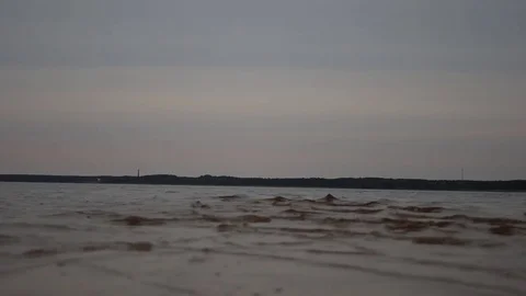 Small Waves Crossing On The Lake Shore HD Stock Footage 76354767
