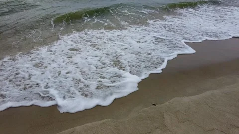 Small waves crushing on sandy coast Stock Footage 260617000