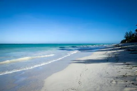 Small waves crushing the shore Stock Photos