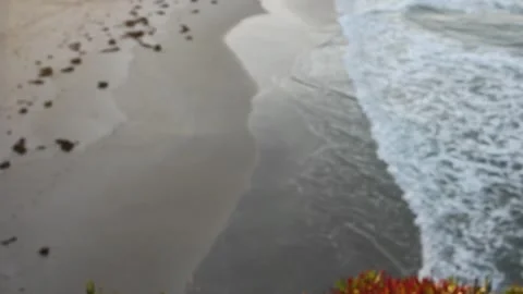 Small waves gently lapping on a Cantabrian beach Stock Footage 290982232