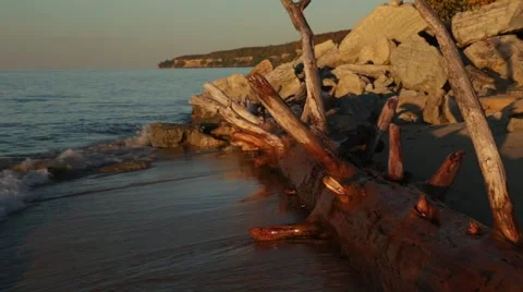 Small waves on lakeshore Stock Footage 46063727