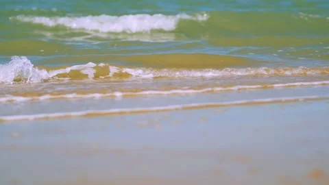 Small waves laping tropical beach Stock Footage 168344187