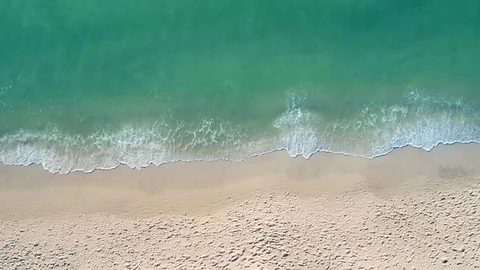 Small Waves Lapping Beach Sand by Aerial Drone Vídeos de archivo 74103944