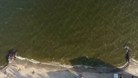 Small Waves Lapping Beach Sand Video stock 82245330