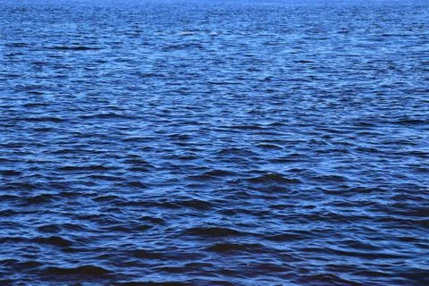 Small waves on the ocean surface, ripples on the water surface Stock Photos