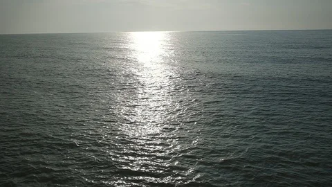 Small waves oscillate in the water Video stock 128797775