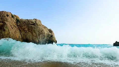 Small Waves At Perfect Beach In Spain With Water Oversplashing Camera 動画素材 162834972