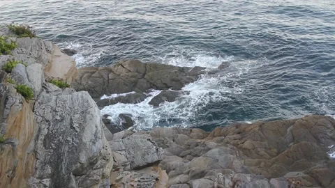 Small waves in the rocks of the sea Stock Footage 254568364