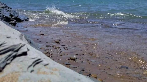 Small waves on a sandy beach. Stock Footage 76182613