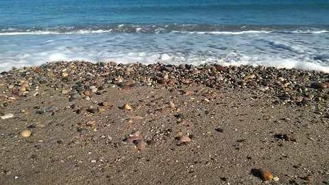Small waves on sandy beach Stock Footage 82079166